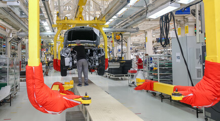 Line for the production of cars with unfinished cars in a row