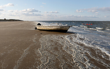 Boat in tideland on Texel island, Netherlands