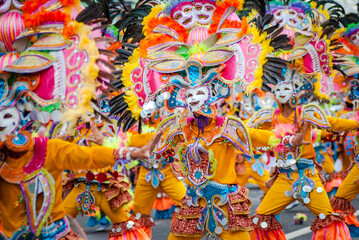 Colorful masks of street dacnce parade performer during Masskara Festival at Bacolod City, Philippines