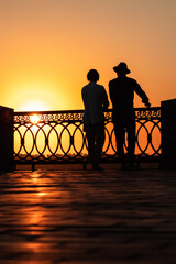 Fototapeta na wymiar Beautiful sunset behind a man