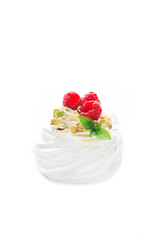 Fototapeta na wymiar Anna Pavlova dessert with raspberries and cream