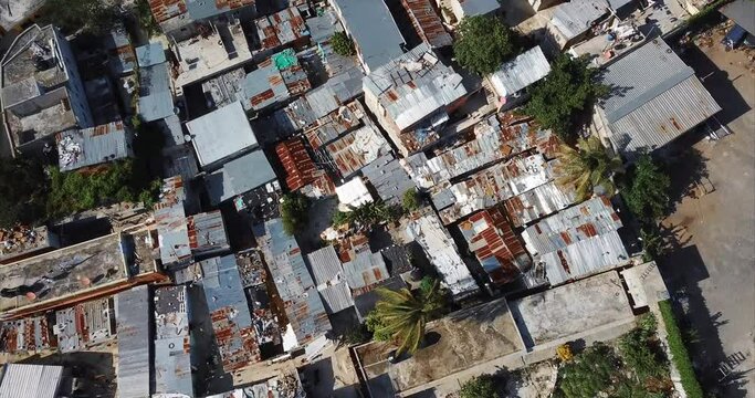 Aerial top view of rooftops of poor people in slums. Hoyo, Friusa, Dominican Republic