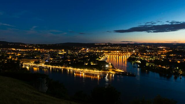 Timelapse sequence of Deutsches Eck and the oldtown of Koblenz, Germany with  Rhine and Moselle River in the night in 4K.