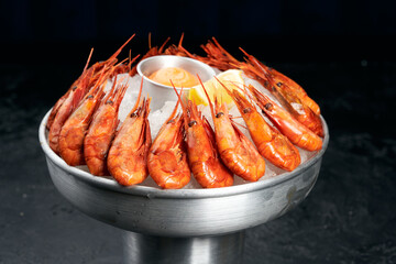 Shrimp on plate in seafood buffet line