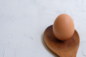 Egg On  Wood Spoon Abstract Minimal Background 