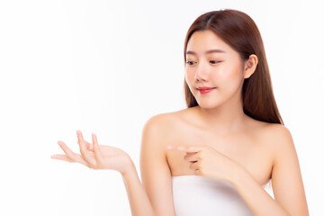 Obraz na płótnie Canvas Beautiful Asian spa woman showing empty copy space on beauty open hand palm for text. Beauty spa girl with perfect skin portrait. Proposing some product. Gesture for advertisement. white background