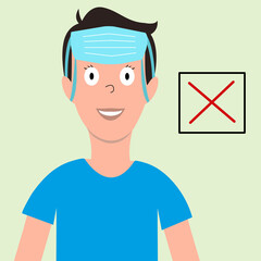How not to wear a mask. Young guy with a medical mask on his forehead. Wrong decision.
