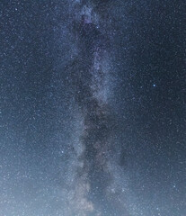 Beautiful starry sky with bright milky way galaxy. Night landscape. Astronomical background.