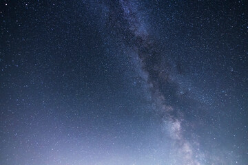 Fototapeta premium Beautiful starry sky with bright milky way galaxy. Night landscape. Astronomical background.