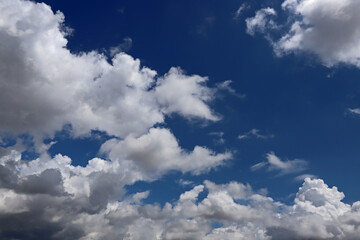 Naklejka na ściany i meble White clouds like cotton in the blue sky