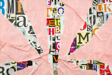 Torn and peeling pink paper on colorful abstract collage from clippings with letters and numbers background.
