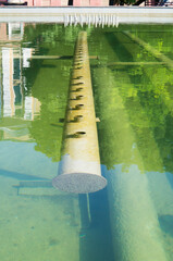 The fountain was turned off. View of the underwater part of the switched off fountain