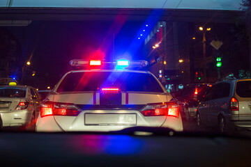 Fototapeta na wymiar police car at night in street