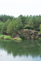 Landscape. Lake in a forest quarry