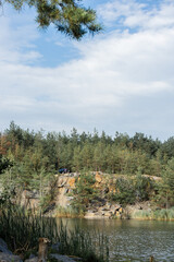 Landscape. Lake in a forest quarry