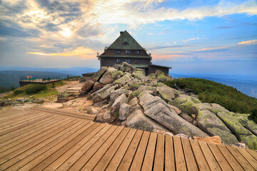 SZKLARSKA POREBA, POLAND - AUGUST 10, 2020: Szrenica mountain shelter (1362 m above sea level) during sunset, Szklarska Poreba, Poland, Europe.