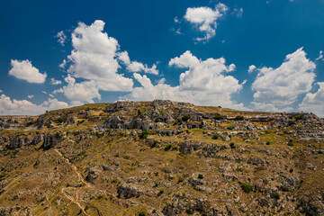 Matera, Basilicata, Italy - The Murgia Materana Park with the typical caves and rock churches carved into the rock. The homes of the ancient inhabitants of the city.