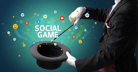 Magician is showing magic trick with SOCIAL GAME inscription, social media marketing concept