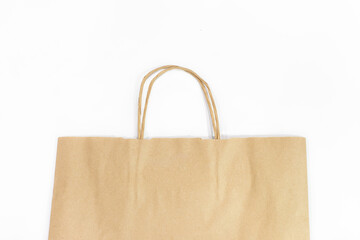 shopping bag lies on a white background with copy space