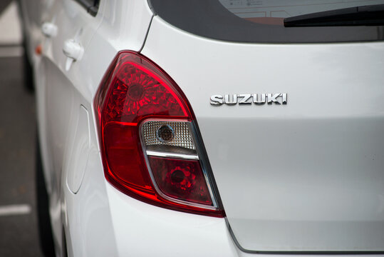 Riedisheim - France - 19 September 2020 - Closeup of rear light and sign on white Suzuki Celerio parked in the street