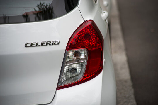 Riedisheim - France - 19 September 2020 - Closeup of rear light and sign on white Suzuki Celerio parked in the street