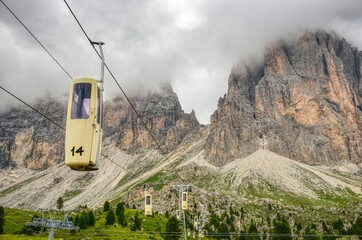 Telecabine Gondelbahn Sassolungo to Forcella del Sassolungo in the Dolomite Alps, South Tyrol, Italy