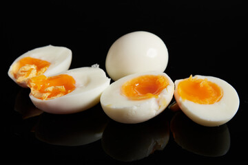 Soft Boiled Egg on Black Background