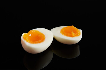 Soft Boiled Egg on Black Background