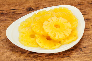 Marinated pineapple rings in the bowl