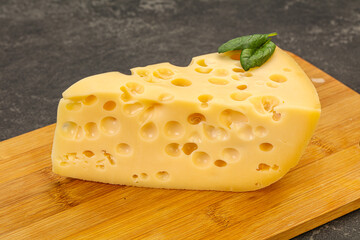 Maasdam cheese - yellow triangle with holes