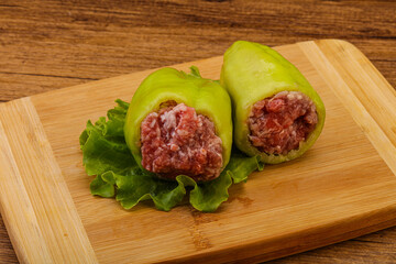 Raw stuffed pepper for cooking