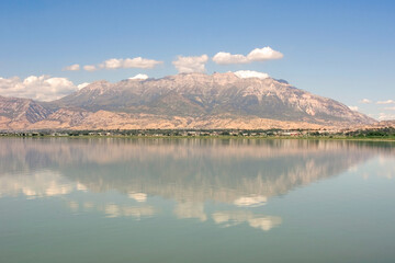 A scenic view of Mount Timponogos from the middle of Utah Lake. Provo Utah.