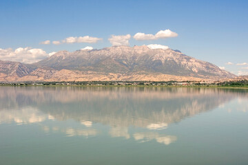 A scenic view of Mount Timponogos from the middle of Utah Lake. Provo Utah.
