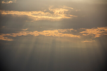 sun rays and clouds