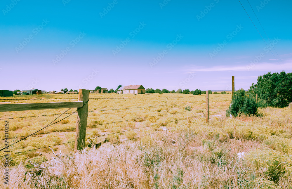 Wall mural American rural farm scene from highway in vintage effect