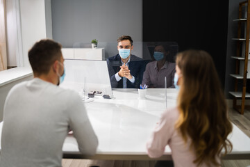 Young Family Couple Meeting Consultant Or Lawyer