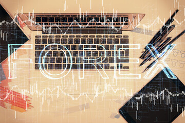 Multi exposure of forex chart drawing over table background with computer. Concept of financial research and analysis. Top view.
