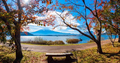 Panorama of Kawaguchiko on a Sunny autumn day. Bench with a view of mount Fuji. Lake Kawaguchiko...