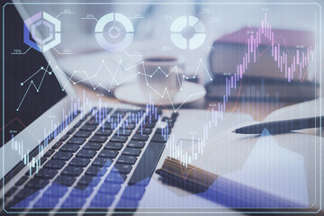 Double exposure of financial chart drawing and desktop with coffee and items on table background. Concept of forex market trading