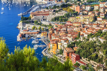 Beautiful top view of Villefranche-sur-Mer bay with boats and yacht. Villefranche-sur-Mer is luxury...