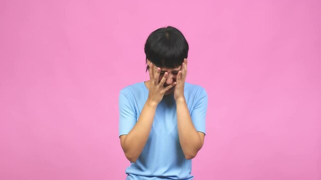 Young caucasian woman desperate and sad, crying inconsolably, is pessimistic and melancholy