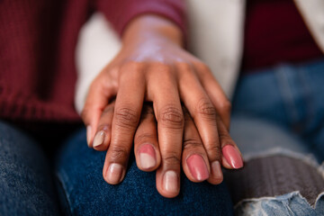 close up detail offemale hands multigenerational family over each other. commitment, aging, care,...