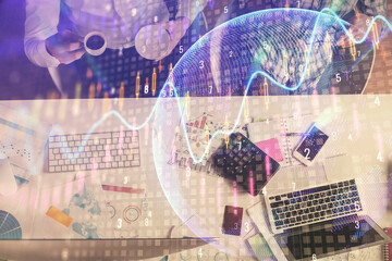 Double exposure of man and woman working together and financial chart hologram drawing. market analysis concept. Computer background. Top View.