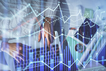 Multi exposure of woman hands working on computer and forex chart hologram drawing. Top View. Financial analysis concept.