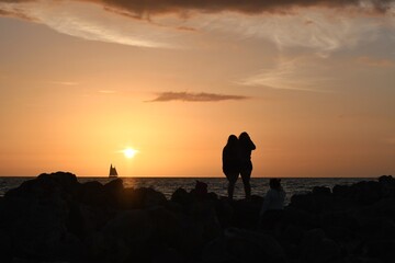 Two best friends watching the sunset in Clearwater, Florida