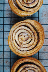 Freshly Baked Traditional Sweet Cinnamon Rolls on a Cooling Rack