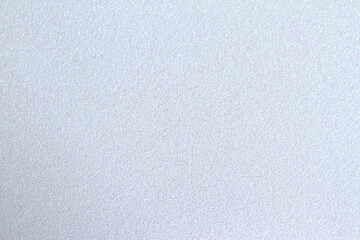 Silver texture background. White Christmas lights glitter
