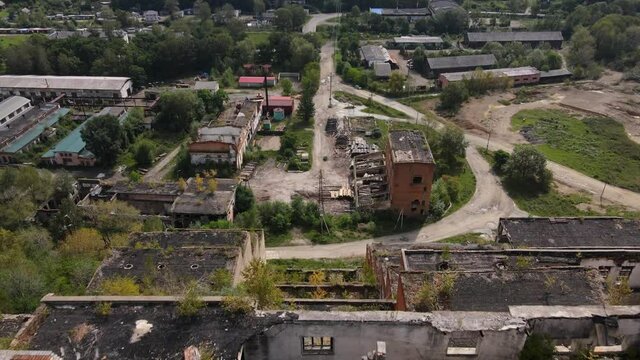 View from above. Abandoned tin mining plant in Russia. Flying over the permitted buildings of the mining and processing plant in Kavalerovo
