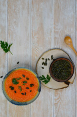 Autumn delicious healthy food, hearty pumpkin soup top view, healthy nutrition on autumn dinner, the concept of thanksgiving day