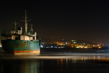 Fototapeta na wymiar Ship at night, typhoon Maysak, North Korea